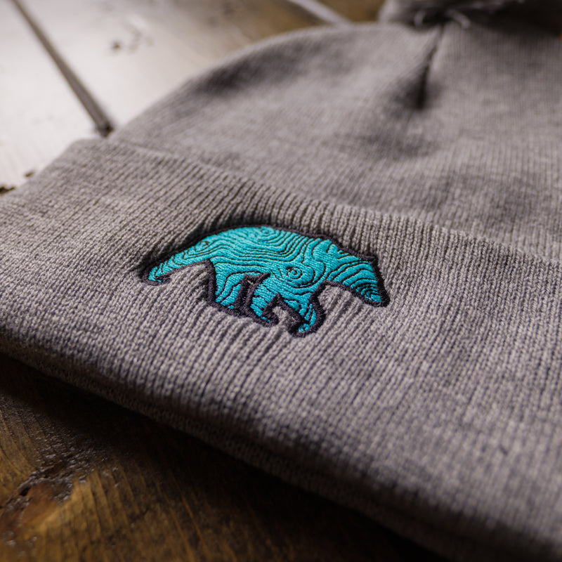Load image into Gallery viewer, Lifestyle Overland Turquoise &amp; Grey Topo Bear Beanie
